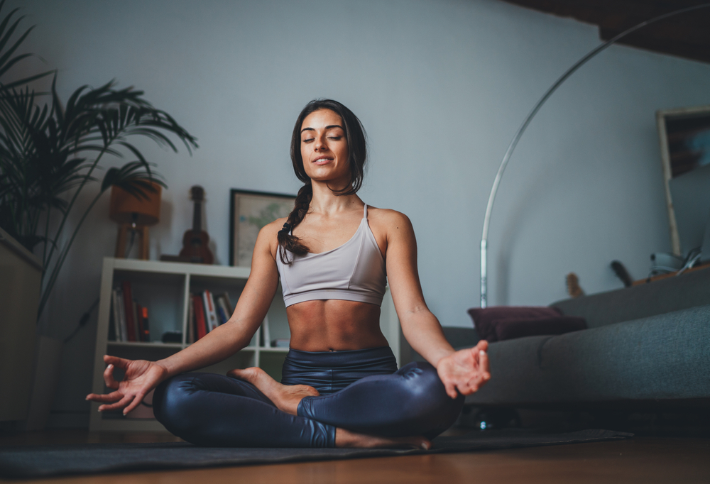 woman meditating trying to be more present